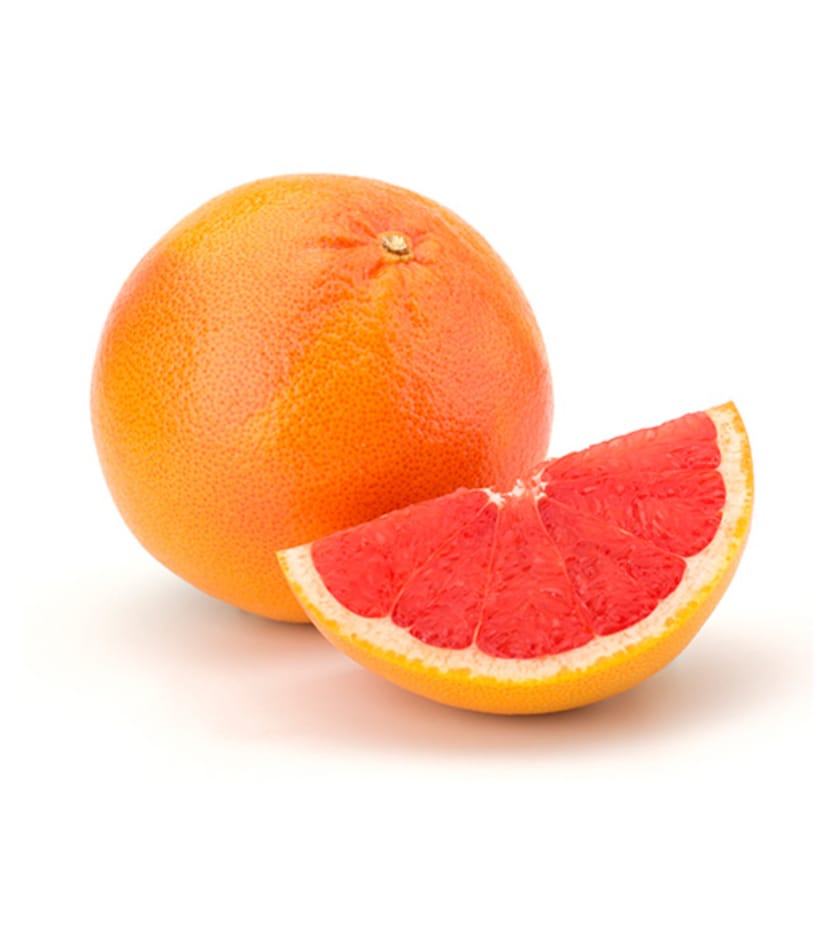 Grapefruit cut in half on a white background.