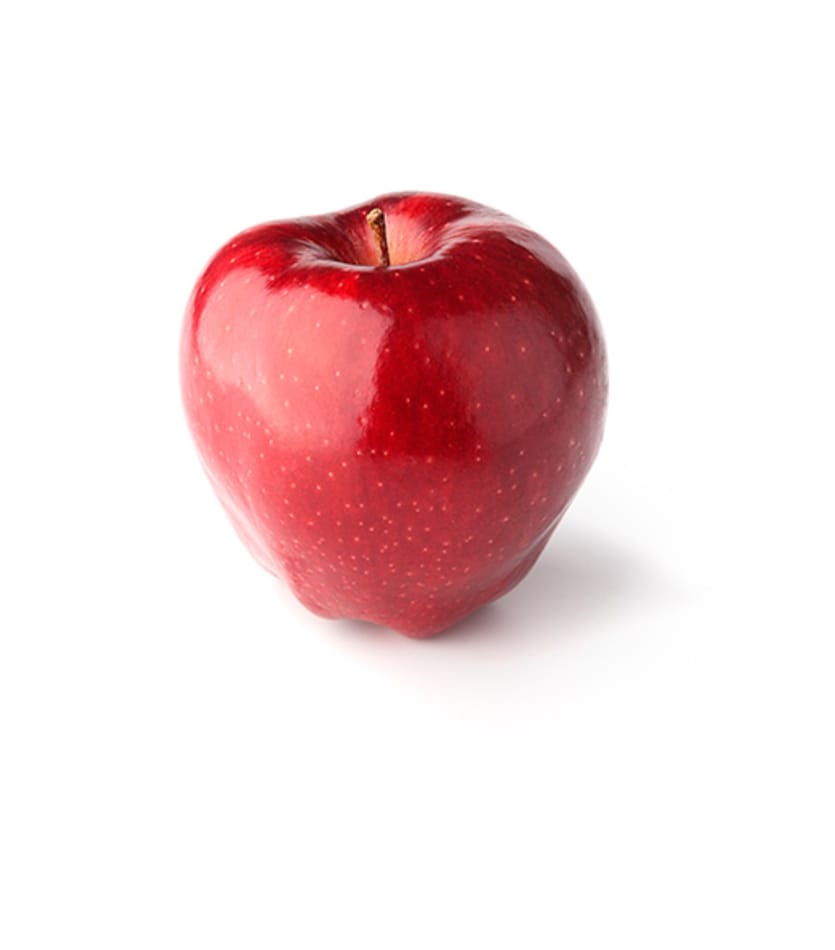A red delicious apple on a white background.